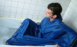 getting a poncho wet in the bath