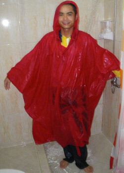 wet poncho cape under shower